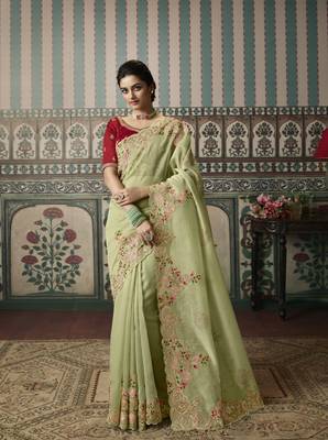 light green premium embroidered fancy fabric designer saree with un-stitched blouse fabric 1