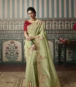 light green premium embroidered fancy fabric designer saree with un-stitched blouse fabric