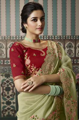 light green premium embroidered fancy fabric designer saree with un-stitched blouse fabric 2