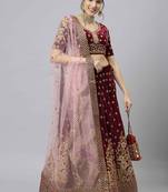 Shubhkala Engaging Purple Zari Sequins And Thread Embroidered Velvet Semi Stitched Dulhan Lehenga