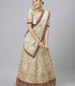 Shubhkala Marvelous Off White Zari Sequins And Thread Embroidered Art Silk Semi Stitched Bridal Lehenga