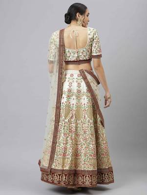 Shubhkala Marvelous Off White Zari Sequins And Thread Embroidered Art Silk Semi Stitched Bridal Lehenga 2