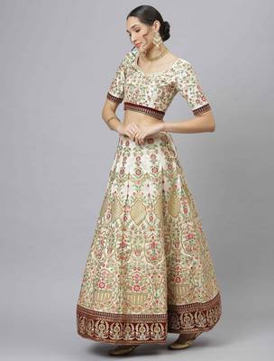 Shubhkala Marvelous Off White Zari Sequins And Thread Embroidered Art Silk Semi Stitched Bridal Lehenga 3