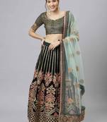 Shubhkala Pleasant Dark Green Zari Sequins And Thread Embroidered Velvet Semi Stitched Bridal Lehenga