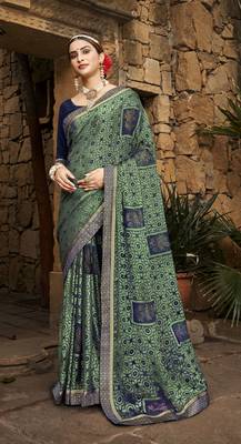 Lifestyle green woven brasso brasso sarees with unstitched blouse pcs 1