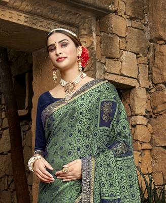 Lifestyle green woven brasso brasso sarees with unstitched blouse pcs 2