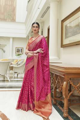 Pink woven silk saree with blouse 1