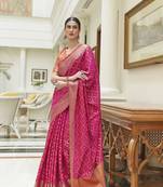 Pink woven silk saree with blouse