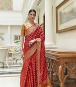 Red woven silk saree with blouse