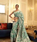 Light green woven cotton saree with blouse