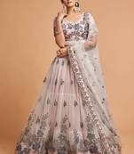 Grey embroidered net semi stitched lehenga