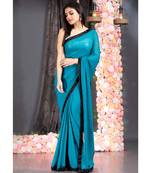 sapphire blue pure georgette hand embroidered black lace with fringes on pallu