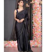 black satin saree with embroidered border