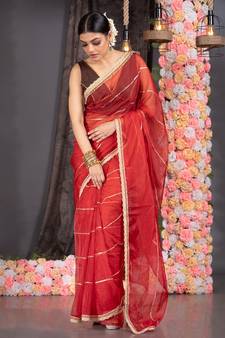 red organza saree with gota work and scallop border