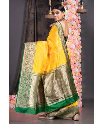 yellow pure katan silk saree with green and golden border pallu 3
