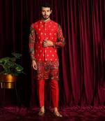 Red Printed Habutai Kurta paired with cottan silk pants and Raw silk Embroidered Bundi