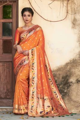 Yellow woven raw silk saree with blouse 1