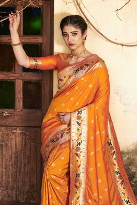 Yellow woven raw silk saree with blouse 2