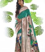 Red woven paithani silk saree with blouse