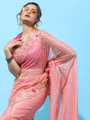 Peach embroidered net saree with blouse 4