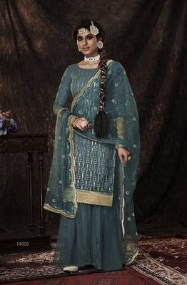 Bewitching Dark firozi Sequins Embroidered Net Salwar Suit 1