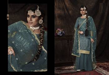Bewitching Dark firozi Sequins Embroidered Net Salwar Suit 4