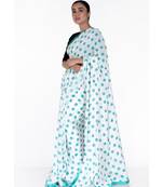 green polka dot boby print chiffon saree with green satin border