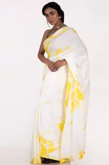 white and yellow tie and dye habutai silk blend saree with cotton lace border