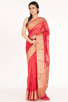 red kora organza banarasi silk saree with golden border and woven pallu