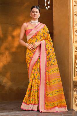 Yellow woven brasso saree with blouse 1