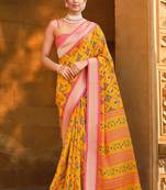 Yellow woven brasso saree with blouse