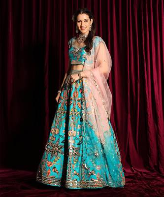 Turquoise Heavy Embroidered Lehenga Blouse With A Dupatta 1