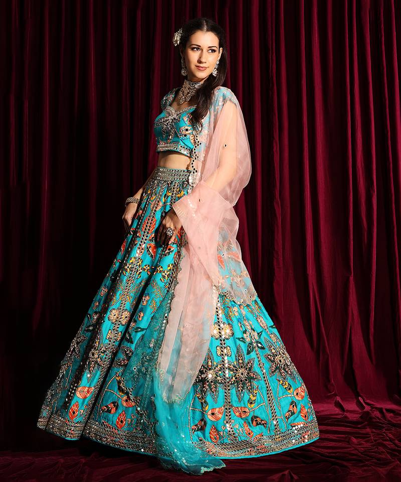 Turquoise Heavy Embroidered Lehenga Blouse With A Dupatta