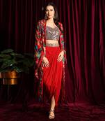 Red Draped Skirt And A Bustier With Printed Cape