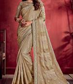 Beige embroidered linen saree with blouse