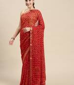 Red printed chiffon saree with blouse