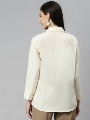 Off-white plain cotton tunics
 4