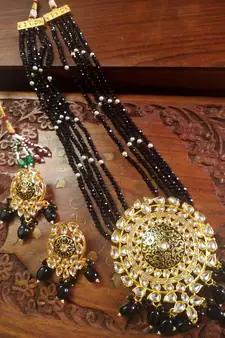 Black designer floral meenakari kundan studed onyx stone multilayer necklace set with earrings