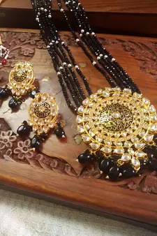 Black designer floral meenakari kundan studed onyx stone multilayer necklace set with earrings