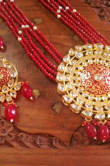 Red designer floral meenakari kundan studed onyx stone multilayer necklace set with earrings