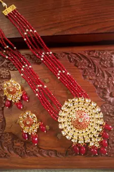 Red designer floral meenakari kundan studed onyx stone multilayer necklace set with earrings