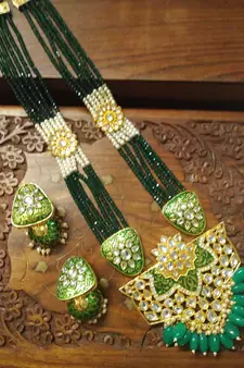 Green designer floral meenakari kundan studed onyx stone multilayer necklace set with earrings