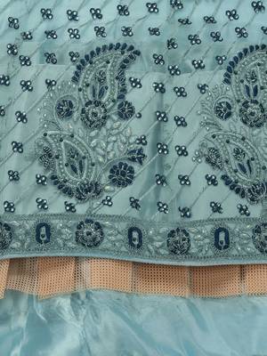 Turquoise embroidered net semi stitched lehenga 4