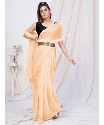 warm off white plain pre draped silk saree 1