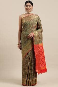 Green woven banarasi silk saree with blouse