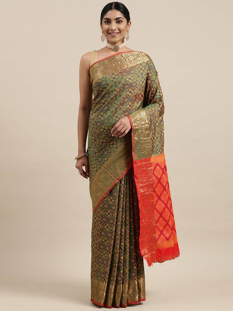 Green woven banarasi silk saree with blouse