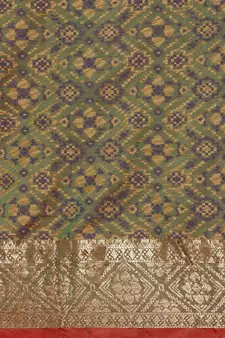 Green woven banarasi silk saree with blouse