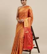 Orange woven banarasi silk saree with blouse