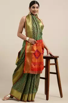 Green woven banarasi silk saree with blouse