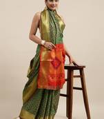 Green woven banarasi silk saree with blouse